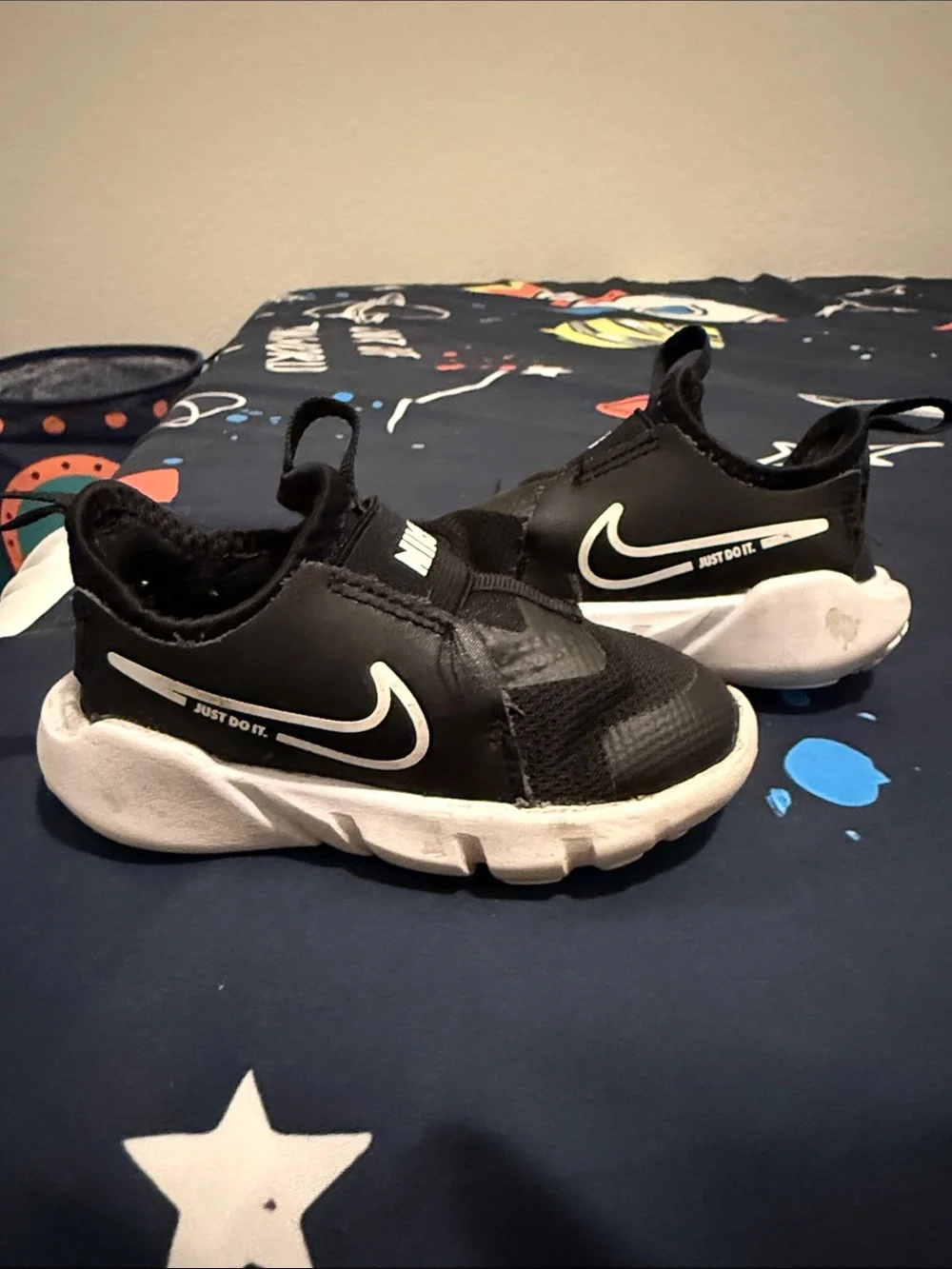 Nike Kids Black and White Slip-On Sneakers with Swoosh